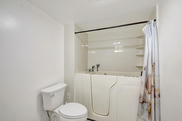 5519 Fairway Park Dr Unit 202, Boynton Beach, FL 33437 - full bathroom featuring toilet and shower / bath combo