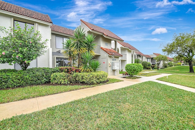 exterior space with a lawn