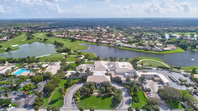 5519 Fairway Park Dr Unit 202, Boynton Beach, FL 33437 - aerial view of property and surrounding area with nearby suburban area, a large body of water, and a golf club