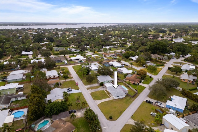 drone / aerial view featuring a water view