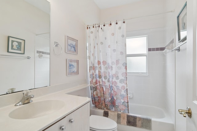 full bathroom featuring shower / bath combination with curtain, vanity, and toilet