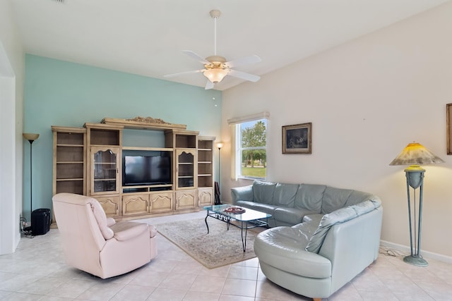 living room featuring light tile patterned floors and ceiling fan