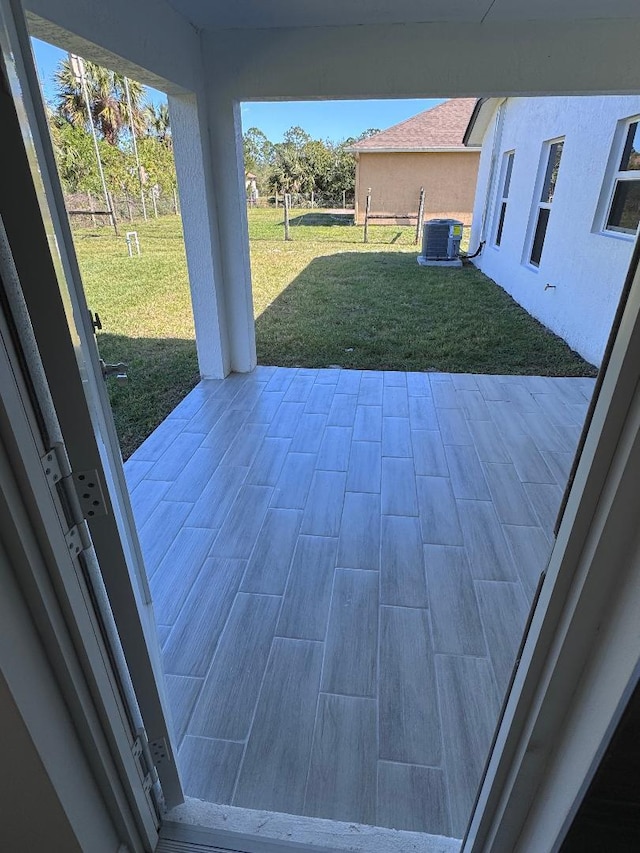 view of patio / terrace featuring cooling unit