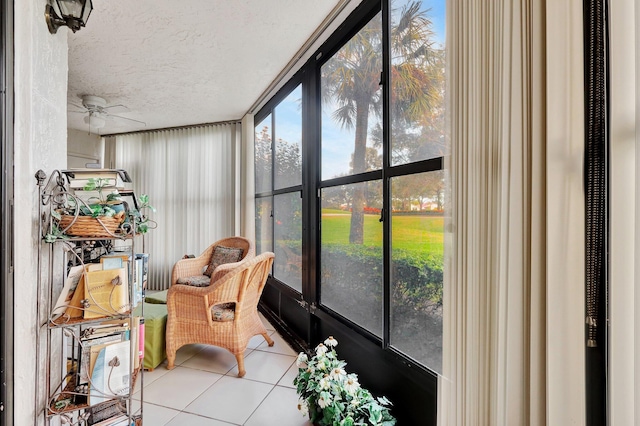 sunroom / solarium with ceiling fan