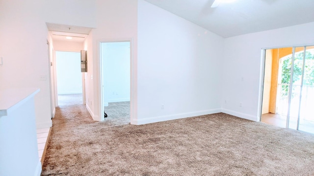 unfurnished room with light carpet