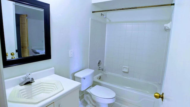 full bathroom featuring vanity, toilet, and tiled shower / bath