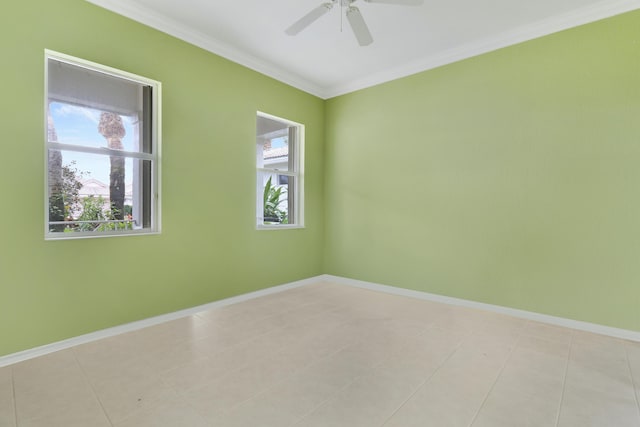 spare room with ceiling fan and ornamental molding