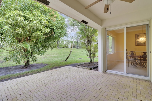 view of patio / terrace featuring ceiling fan