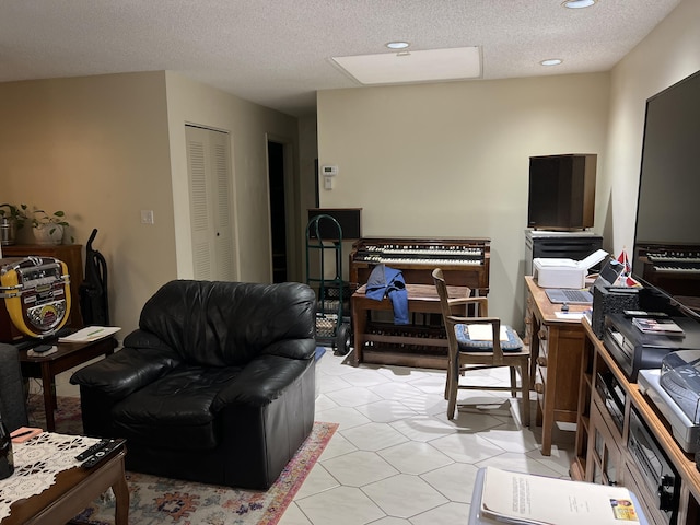 living room featuring a textured ceiling