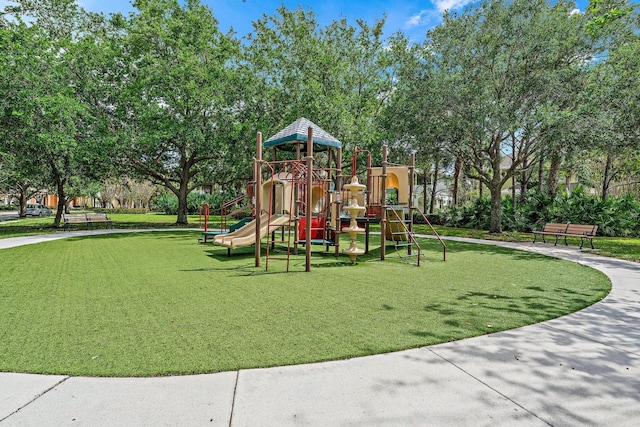 view of playground with a yard