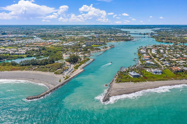 aerial view featuring a water view and a view of the beach