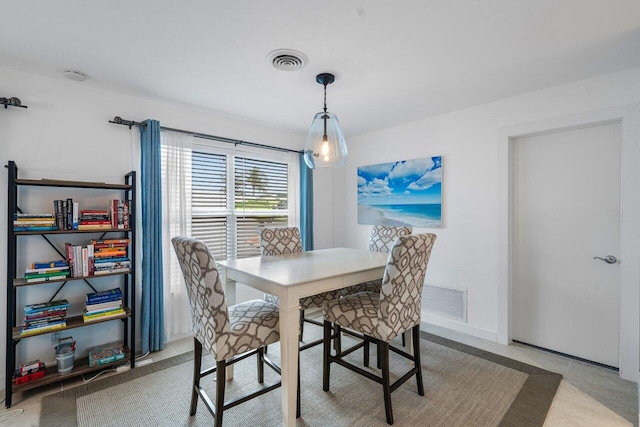 dining area featuring visible vents