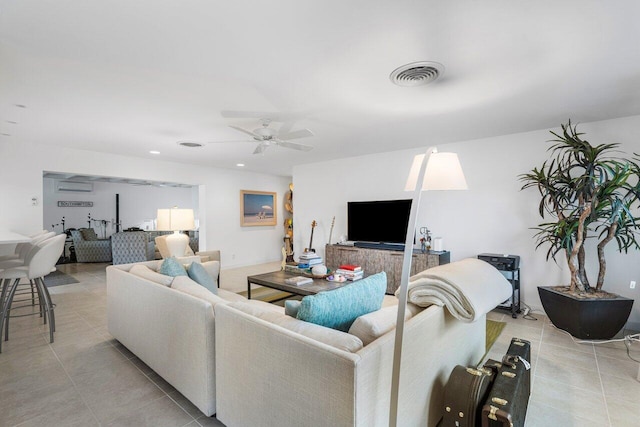 living room with recessed lighting, visible vents, a ceiling fan, and light tile patterned flooring