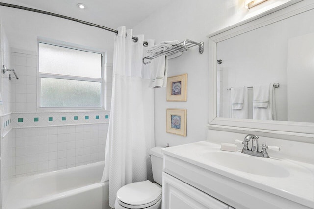 bathroom with toilet, shower / bathtub combination with curtain, and vanity