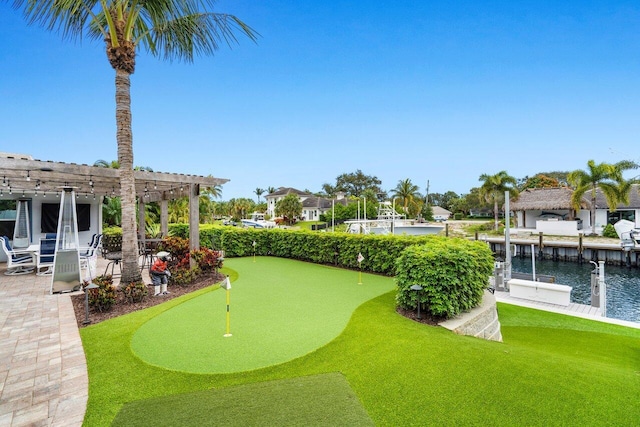 exterior space featuring a water view, a patio, and a pergola