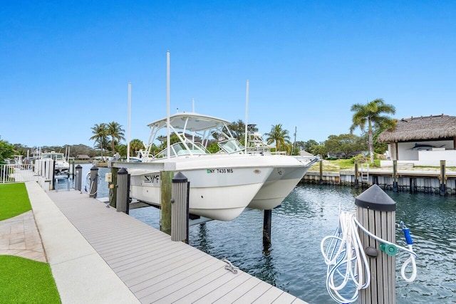 dock area featuring a water view and boat lift