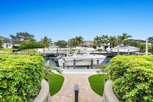 dock area featuring a water view and boat lift