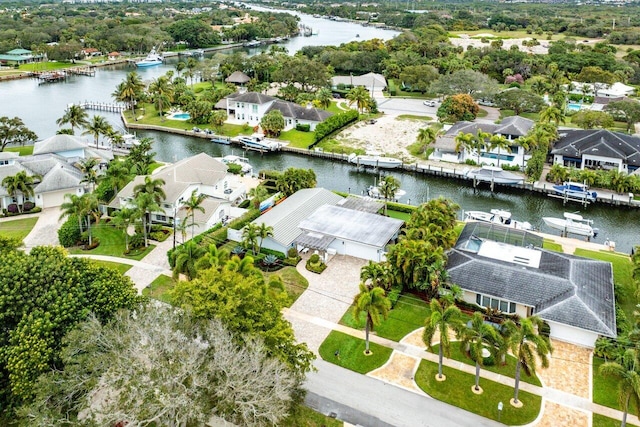 bird's eye view with a water view and a residential view