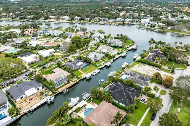 aerial view with a residential view and a water view