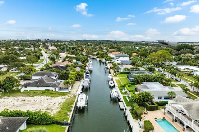 aerial view with a water view and a residential view