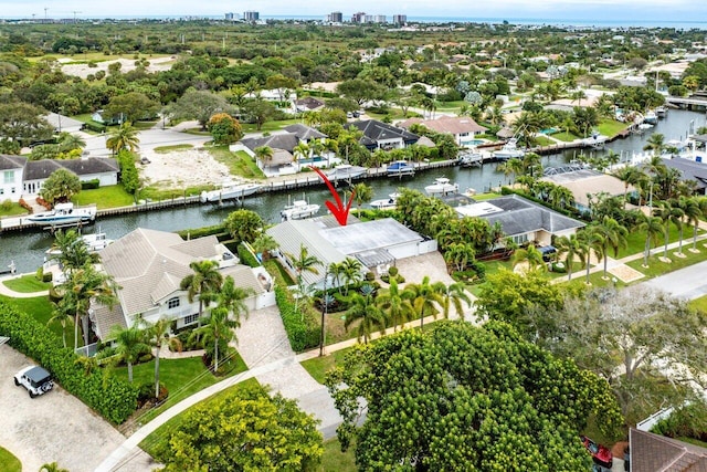 bird's eye view featuring a residential view and a water view