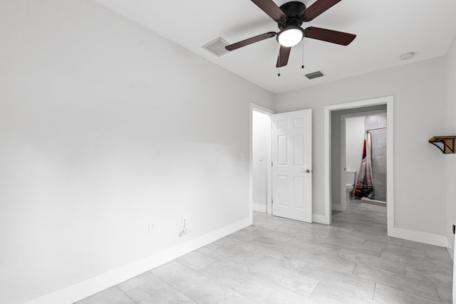 spare room with ceiling fan