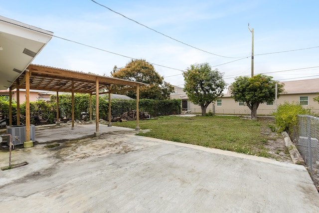 view of yard with a patio and a pergola