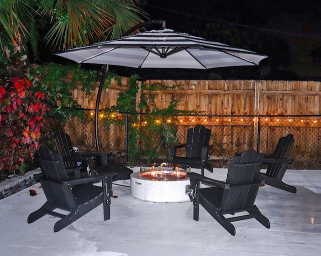 view of patio / terrace featuring a fire pit