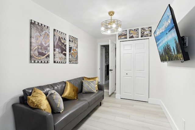 living room with light hardwood / wood-style floors