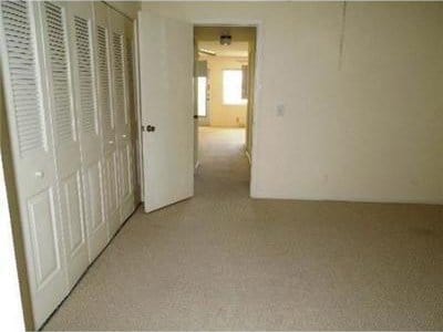 4 Northampton A 4, West Palm Beach, FL 33417 - hallway featuring light carpet