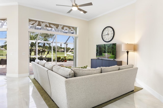 living room featuring ornamental molding and ceiling fan