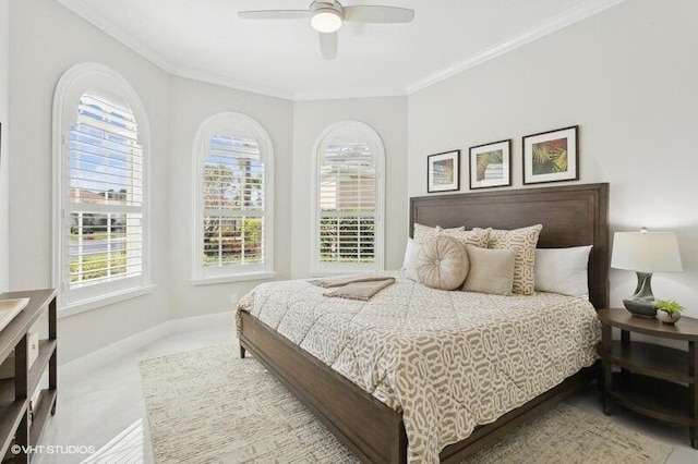 carpeted bedroom featuring crown molding and ceiling fan