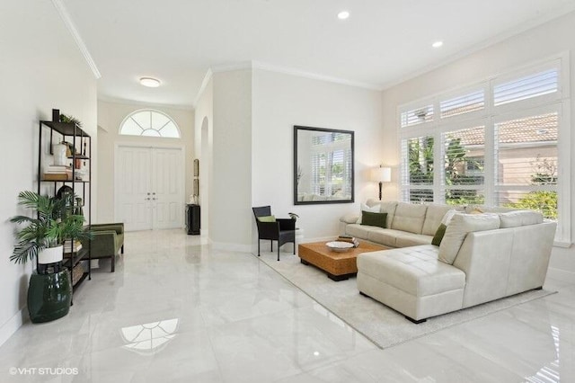 living room with a healthy amount of sunlight and ornamental molding