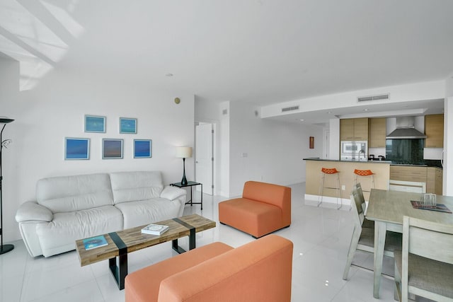 living room featuring light tile patterned floors