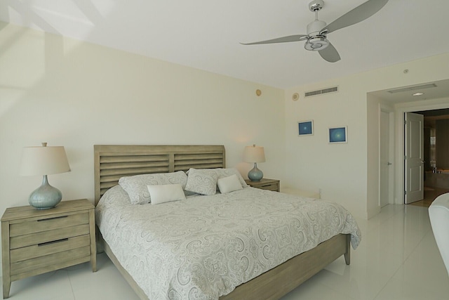 bedroom with light tile patterned floors and ceiling fan