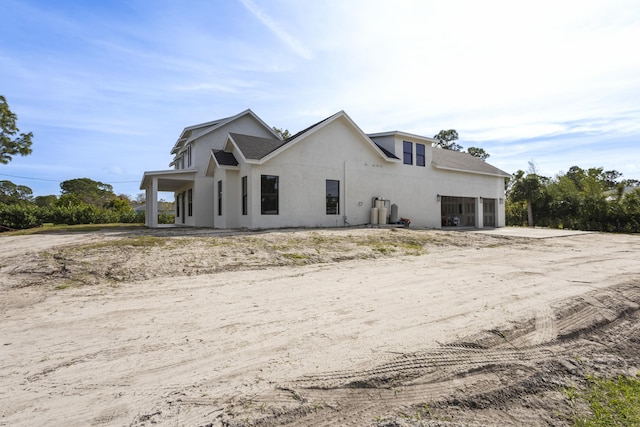 exterior space with a garage