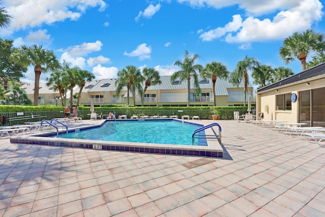 view of pool featuring a patio area