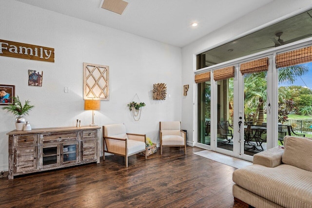 sitting room featuring dark hardwood / wood-style flooring