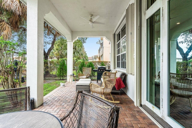 view of patio / terrace featuring ceiling fan