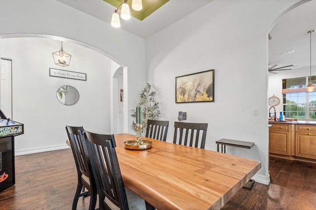 dining area featuring dark hardwood / wood-style floors