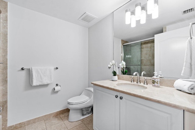 bathroom featuring tile patterned flooring, an enclosed shower, vanity, and toilet