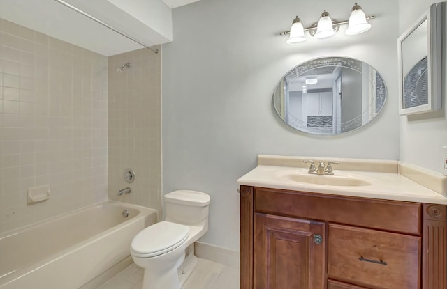 full bathroom with vanity, tiled shower / bath, tile patterned floors, and toilet