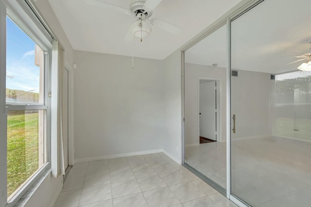 interior space featuring ceiling fan