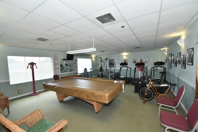 recreation room featuring carpet flooring and a drop ceiling