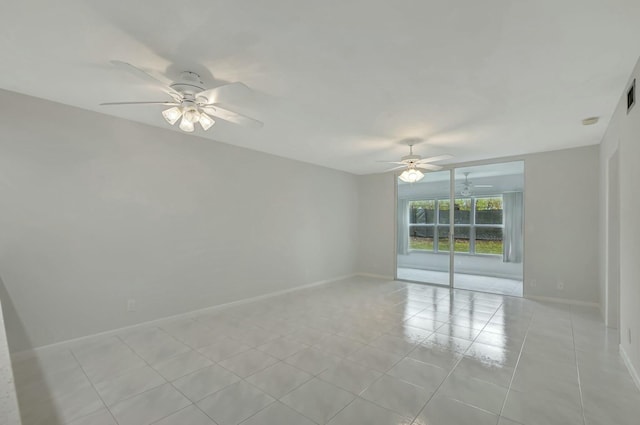 spare room with light tile patterned flooring