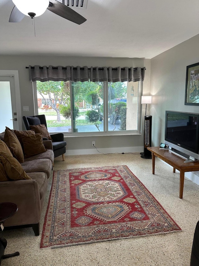 living room with ceiling fan