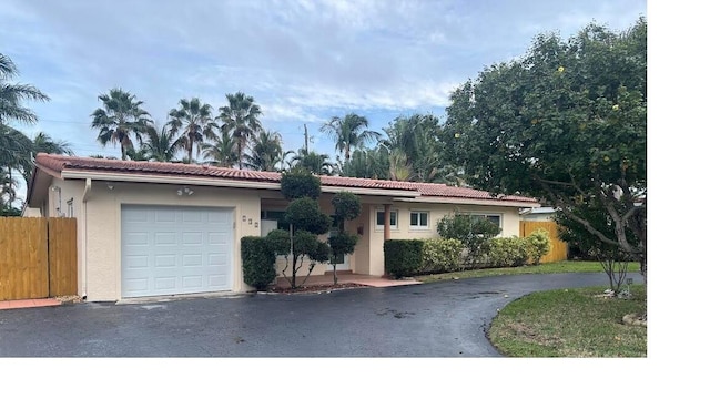 view of front of house with a garage