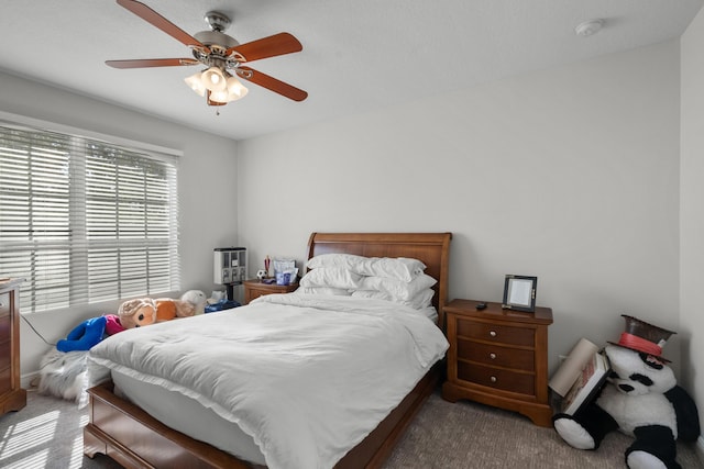 1915 SW Panther Trce, Stuart, FL 34997 - bedroom with carpet and a ceiling fan