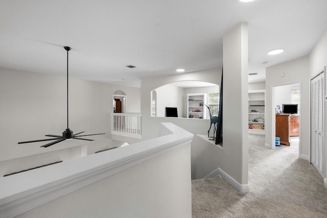 1915 SW Panther Trce, Stuart, FL 34997 - hall with baseboards, recessed lighting, light carpet, and an upstairs landing