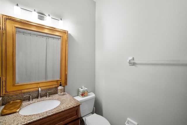 1915 SW Panther Trce, Stuart, FL 34997 - full bath featuring curtained shower, toilet, and vanity